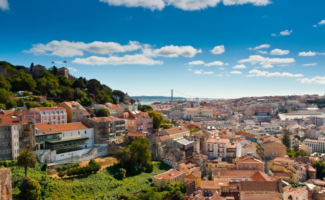 Panoramic view over Baixa and Castelo de Sao Jorge from Alfama, Lisbon, Portugal